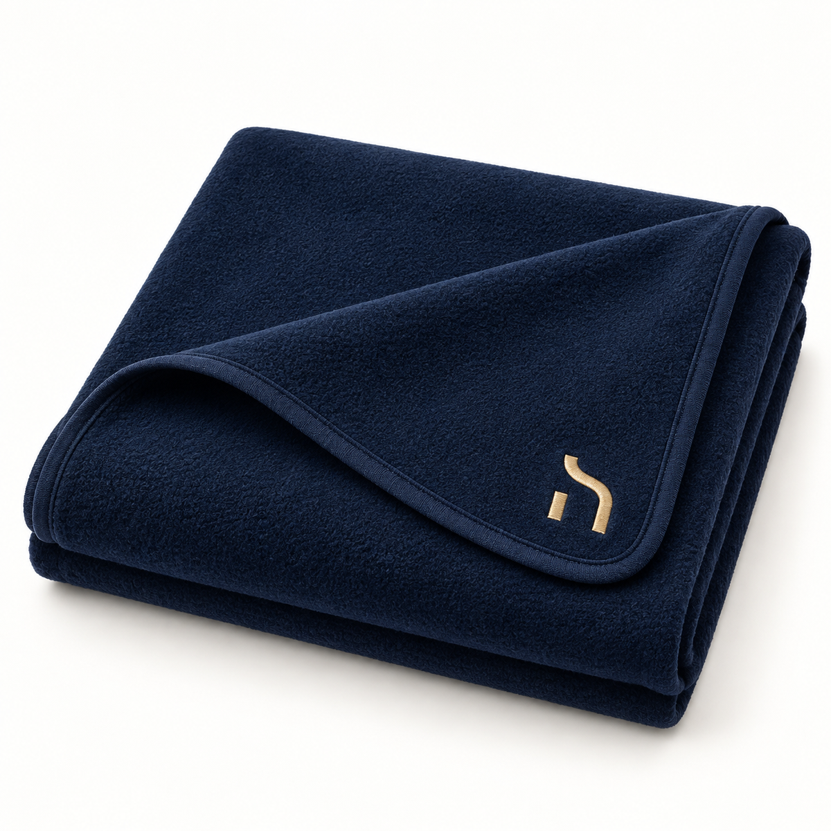 Gefaltete navyfarbene Haensch Coast Fleece Picknickdecke mit goldenem Haensch-Zeichen.