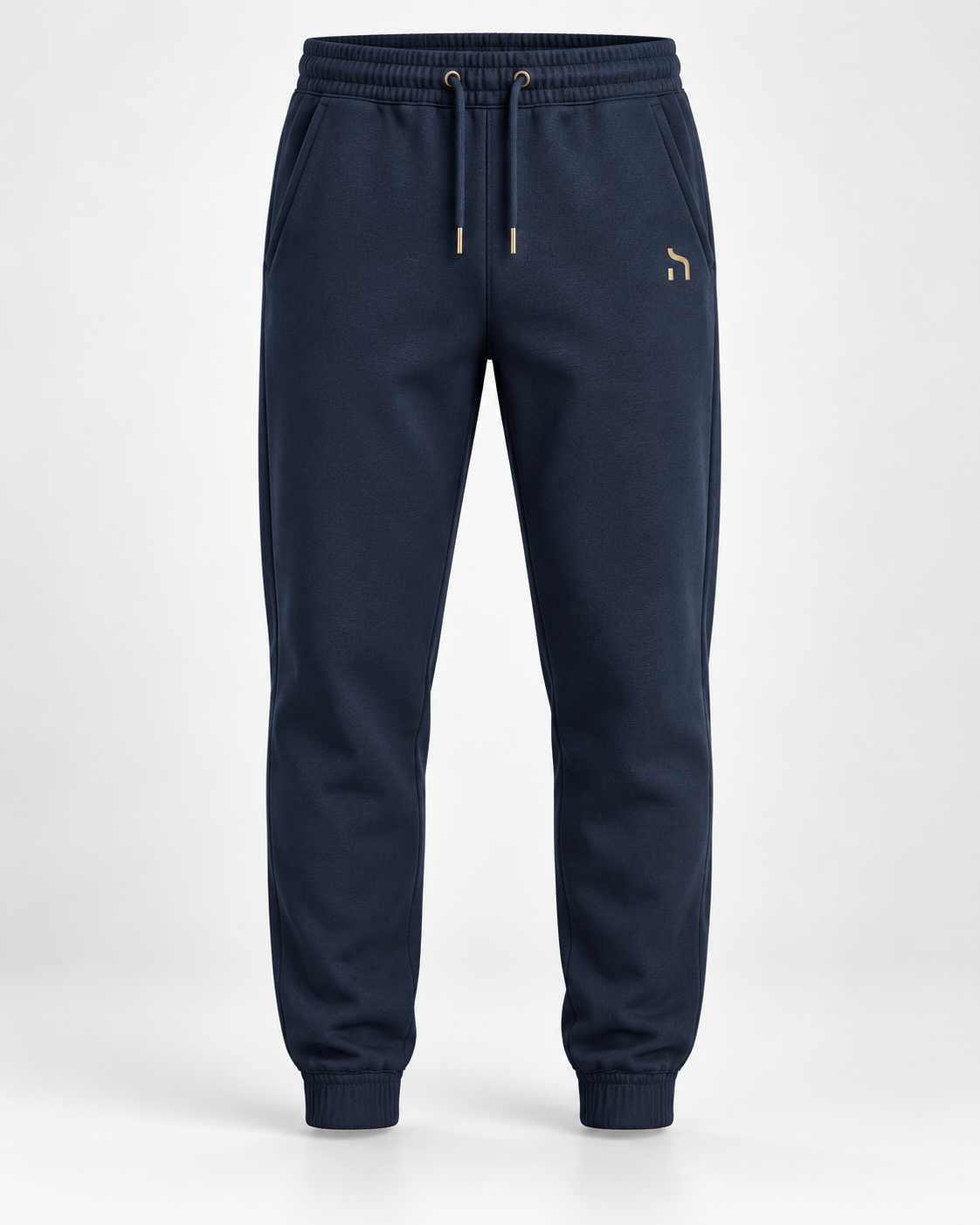 Haensch Coast Premium Jogpants Herren in Deep Navy mit goldenem Haensch-Zeichen, Kordelzug und elastischen Beinabschlüssen.