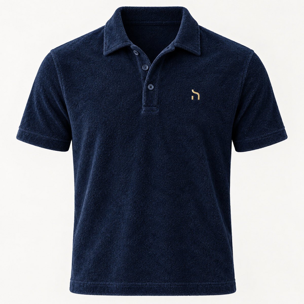 Haensch Coast Terry Polo Herren in Deep Navy aus weichem Frottee mit Polokragen und goldenem Haensch-Zeichen.
