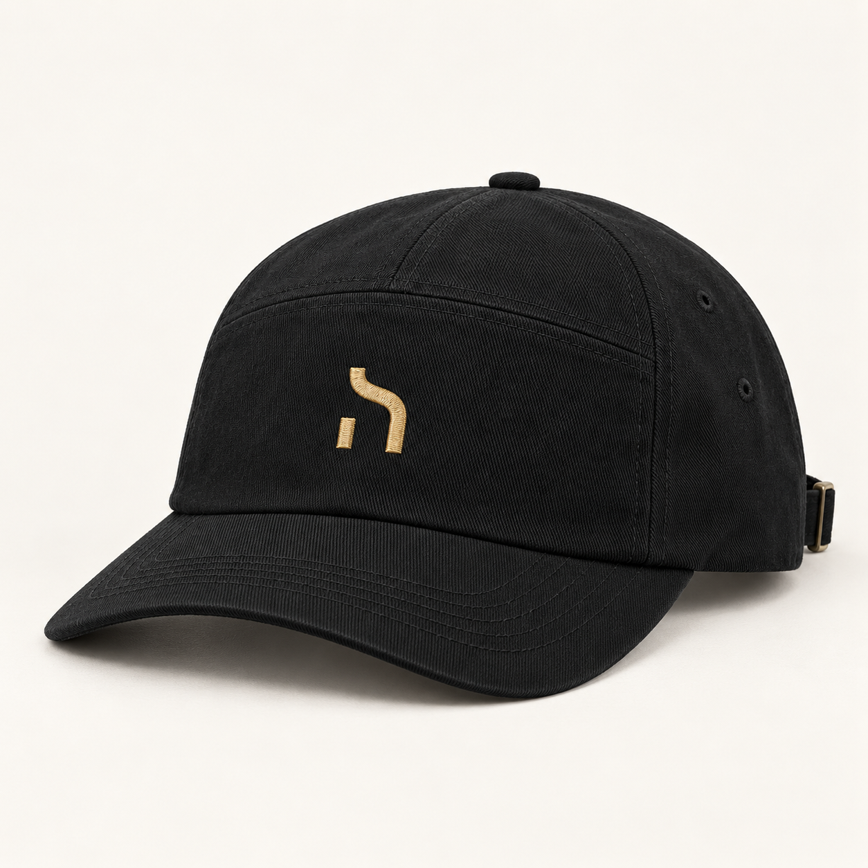 Schwarze Haensch Utility 5-Panel-Cap aus Baumwoll-Twill mit vorgeformtem Schirm und kleinem goldenem Haensch-Zeichen.